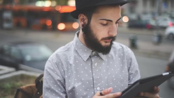 Bearded man using tablet — Stock Video