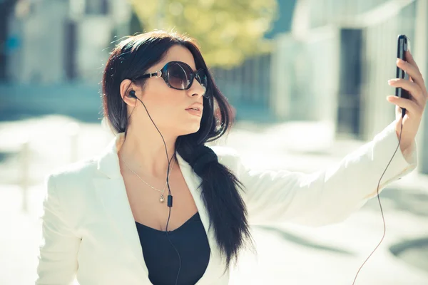 Beautiful long black hair elegant business woman using smartphon — Stock Photo, Image