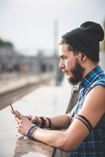 young handsome bearded hipster man