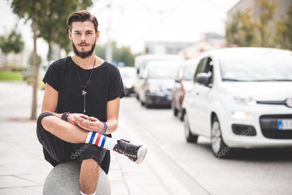 young handsome bearded hipster man