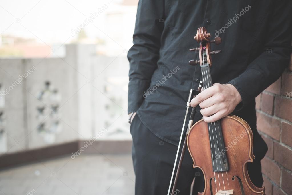 young handsome blonde violinist