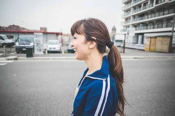 Beautiful woman walking in a desolate landscape — Stock Photo, Image