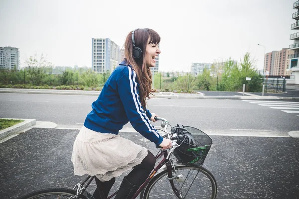 Beautiful woman biker cycling — Stock Photo, Image