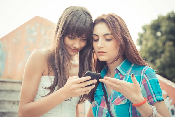 Beautiful hipster young women sisters friends — Stock Photo, Image