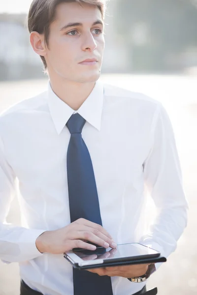 Young handsome elegant blonde model man using tablet — Stock Photo, Image