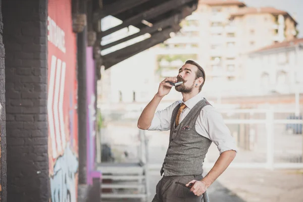 Handsome big moustache hipster man smoking pipe — Stock Photo, Image