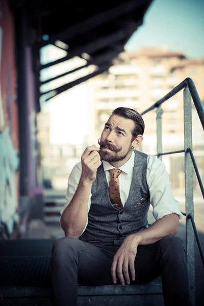 Handsome big moustache hipster man smoking pipe — Stock Photo, Image