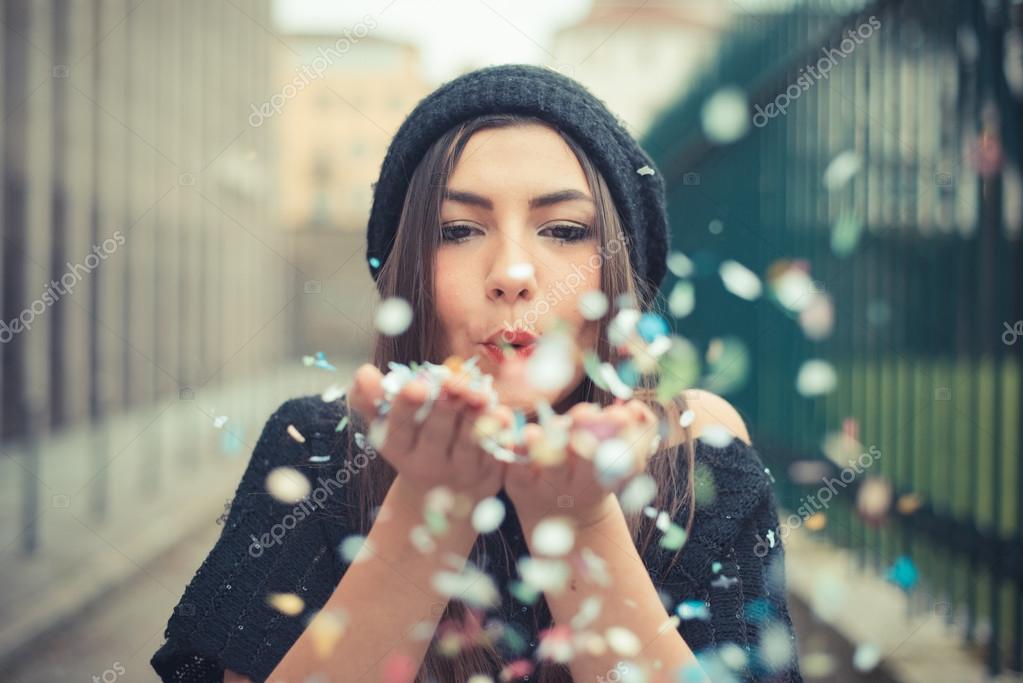 Young beautiful girl with confetti — Stock Photo © peus 61643183