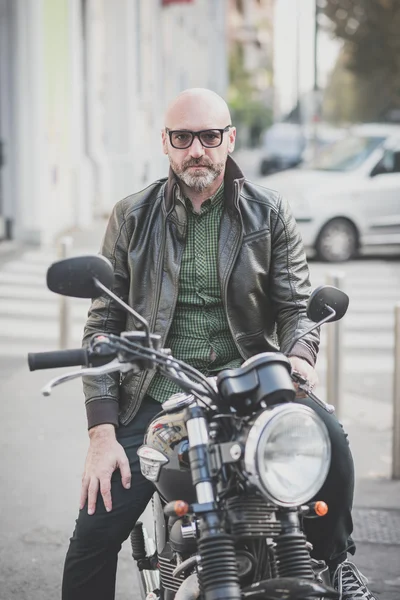 Handsome man riding on motorbike — Stock Photo, Image