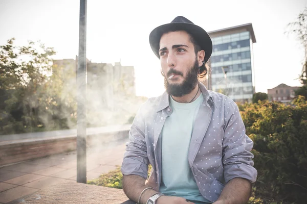 Modern man smoking cigarette — Stock Photo, Image