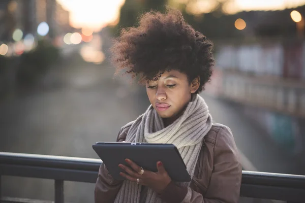 Beautiful african woman with tablet — Stock Photo, Image