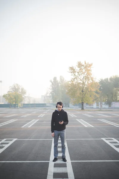 Young asian man in headphones — Stock Photo, Image