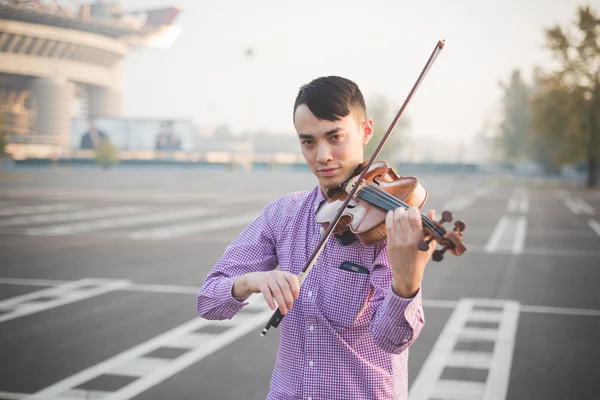 Young crazy musician playing on violin — Stock Photo, Image