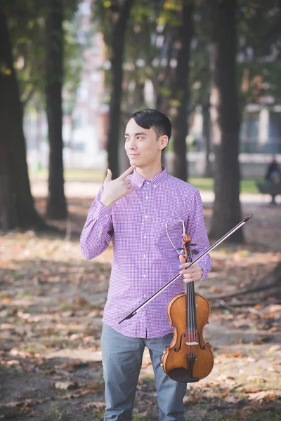 Young crazy musician violinist outdoors — Stock Photo, Image