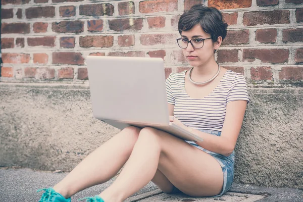 Young hipster woman using notebook — Stock Photo, Image