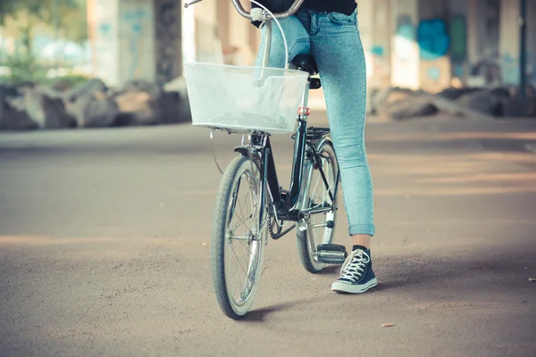 Close up of legs woman on bike — Stock Photo, Image