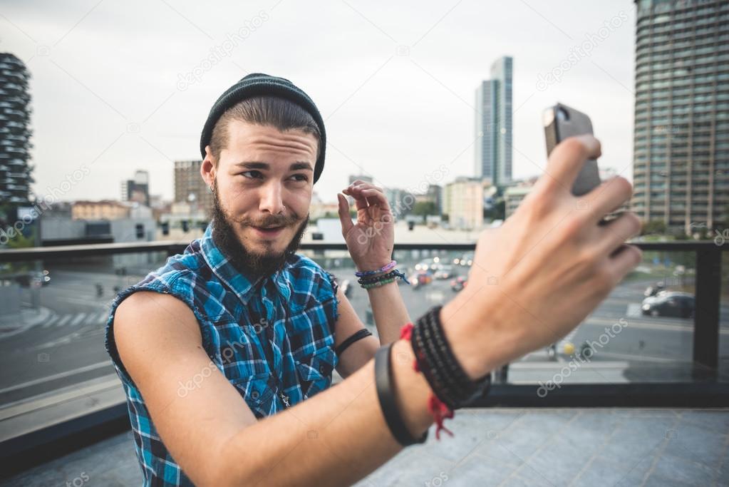 Handsome bearded hipster man