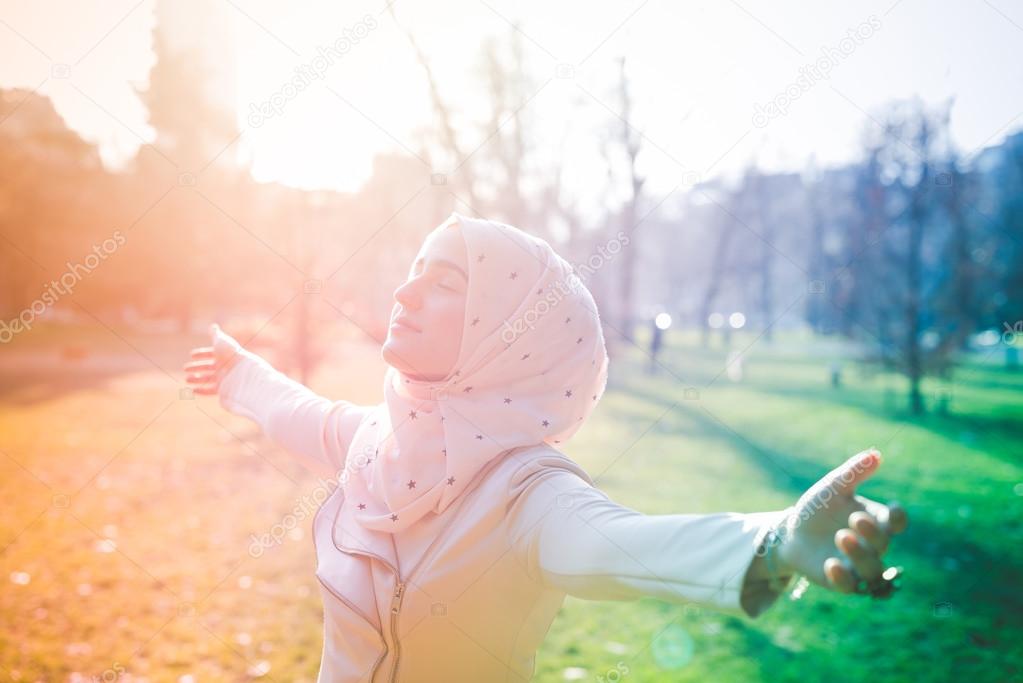 Young muslim woman in  park