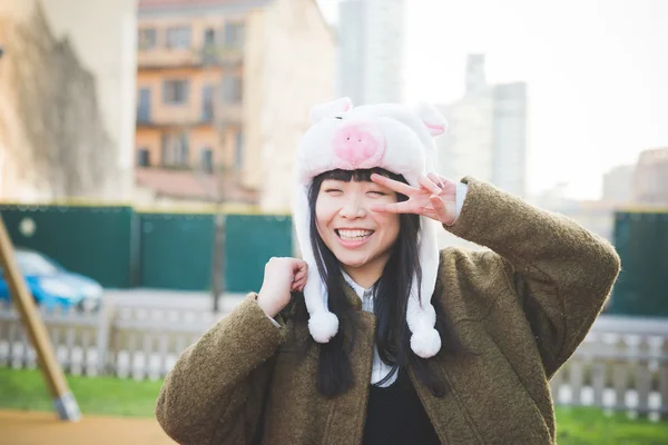 Asian hipster woman in funny hat — Stock Photo, Image