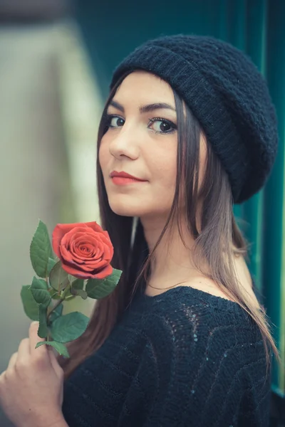 Brunette girl with rose — Stock Photo, Image