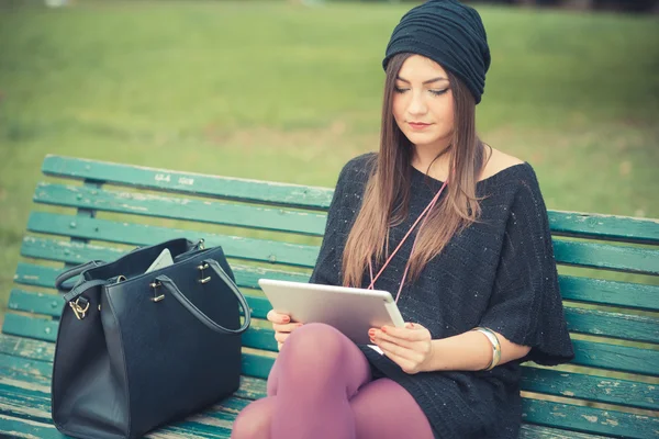 Beautiful girl using tablet — Stock Photo, Image