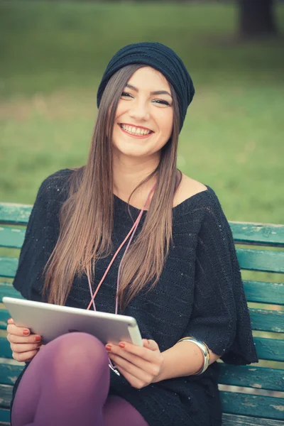 Beautiful girl using tablet — Stock Photo, Image