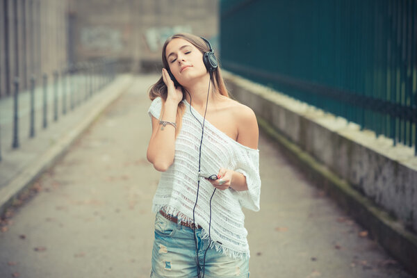 Young girl listening music