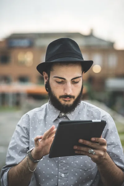 Hipster gay modern man using tablet — Stock Photo, Image