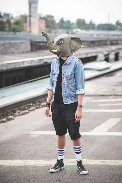 Elephant mask young handsome bearded hipster man — Stock Photo, Image