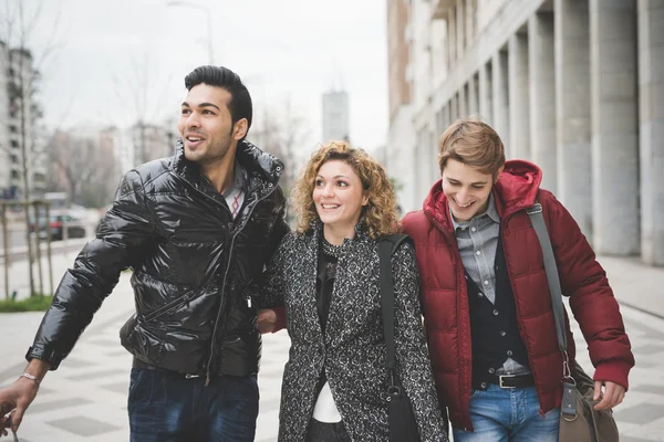 Multiracial  friends walking in city — Stock Photo, Image
