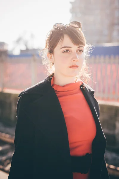 Hipster girl at train station — Stock Photo, Image