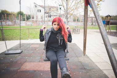 Young beautiful woman on playground