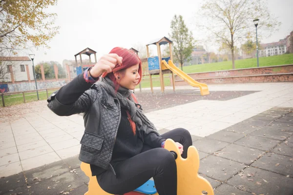 Young beautiful woman on playground — Stock Photo, Image