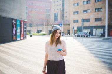 hipster woman with mobile phone