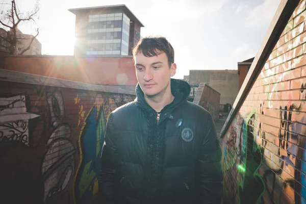 Young handsome man in city — Stock Photo, Image