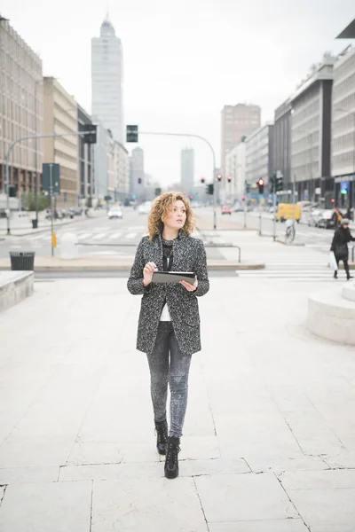 Modern businesswoman in city — Stock Photo, Image