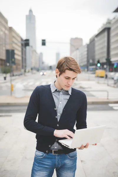 Young  businessman in city — Stock Photo, Image