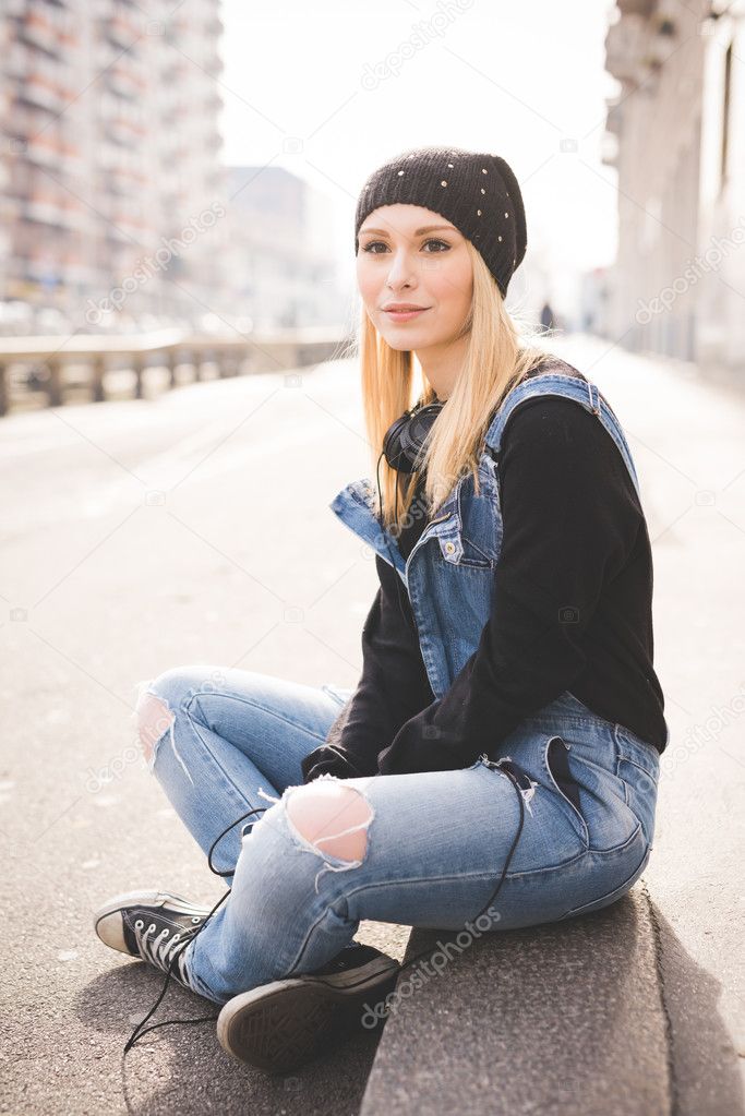 Young beautiful girl in headphones