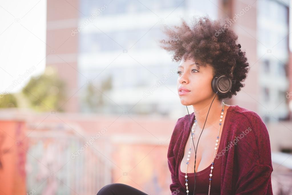 African woman listening music