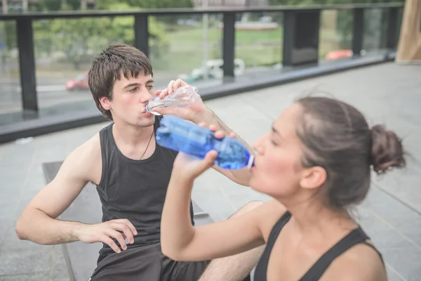 Young handsome sportive man and woman — Stock Photo, Image