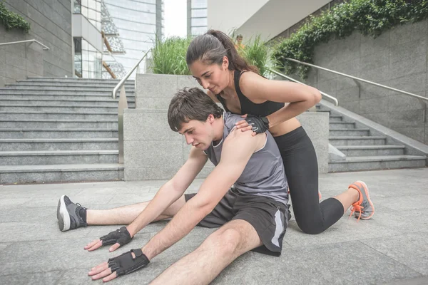 young handsome sportive man and woman