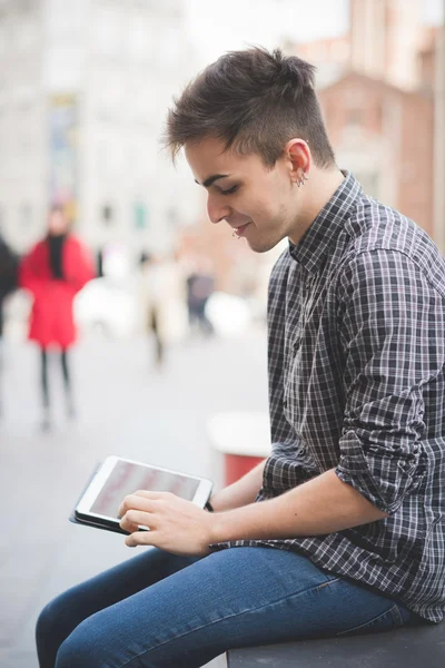 Alternative man using tablet — Stock Photo, Image