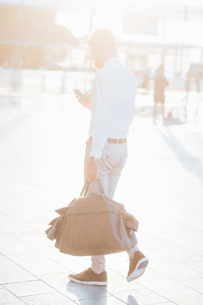 Young handsome businessman walking — Stok fotoğraf