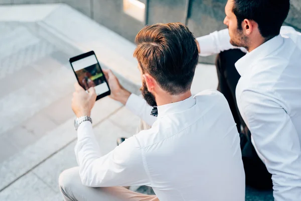 Modern businessmen using tablet — Stock Photo, Image