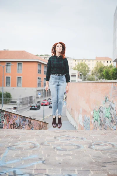 Redhead woman jumping — Stock Photo, Image