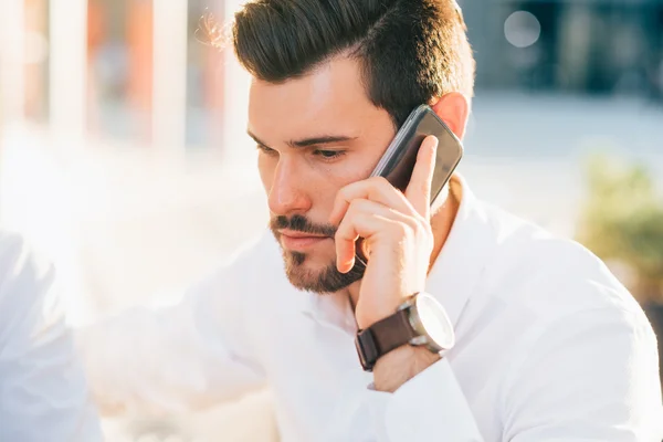 Modern businessman talking smartphone — Stock Photo, Image