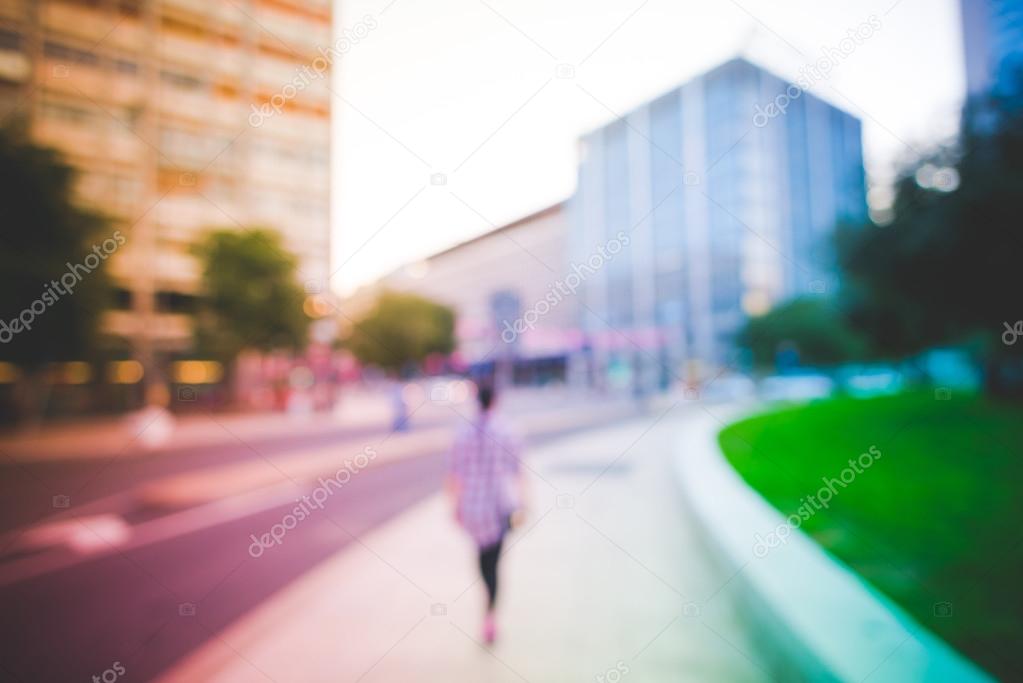 person walking alone in the street