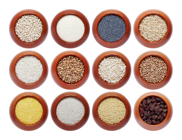 Colección de diferentes cereales en macetas . Imágenes de stock libres de derechos