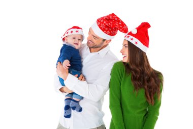 Santa şapka giymiş oğluyla mutlu anne