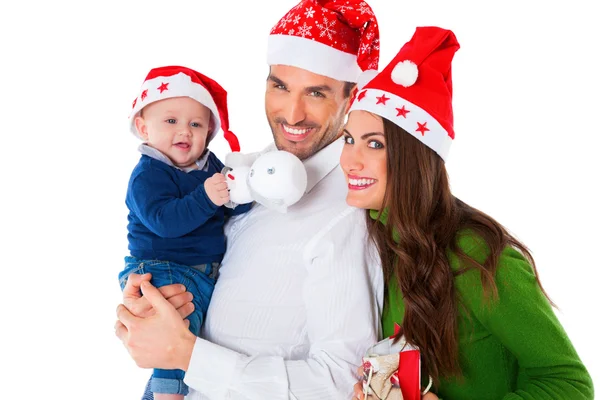 Happy parents with baby boy wearing Santa hats — Stock Photo, Image